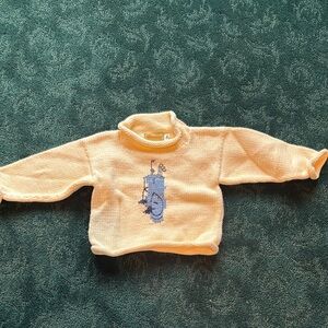 Cream Sweater with Blue Golf Bag Design